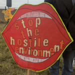 Stop hostile environment placard